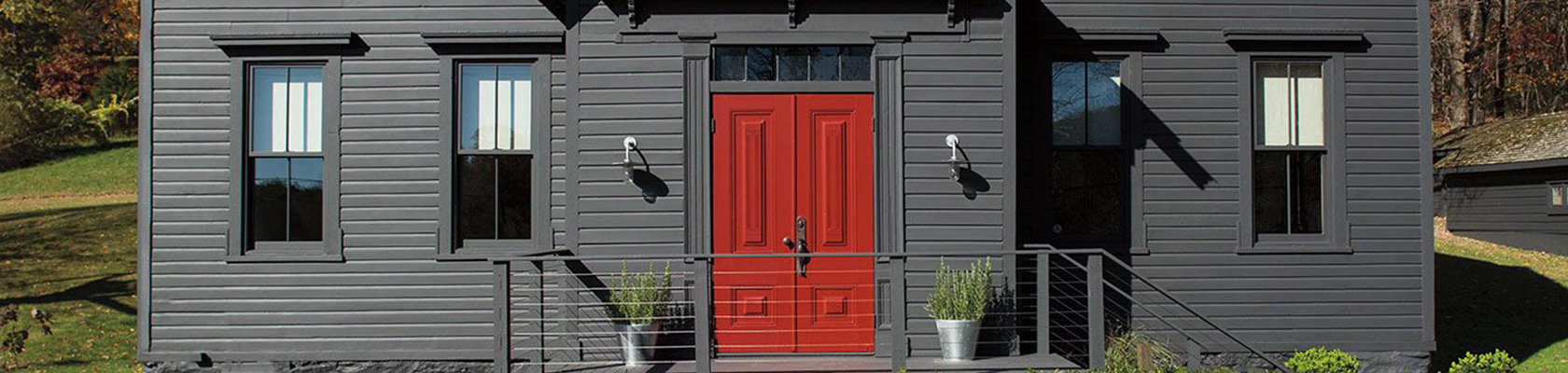 grey house with red front door