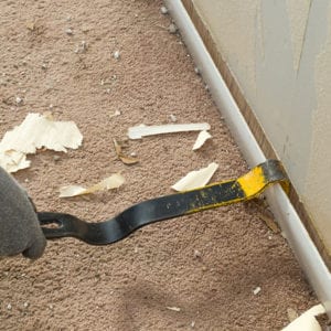 image showing removal of baseboard