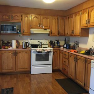 Image of 90's kitchen with oak colours cabinets