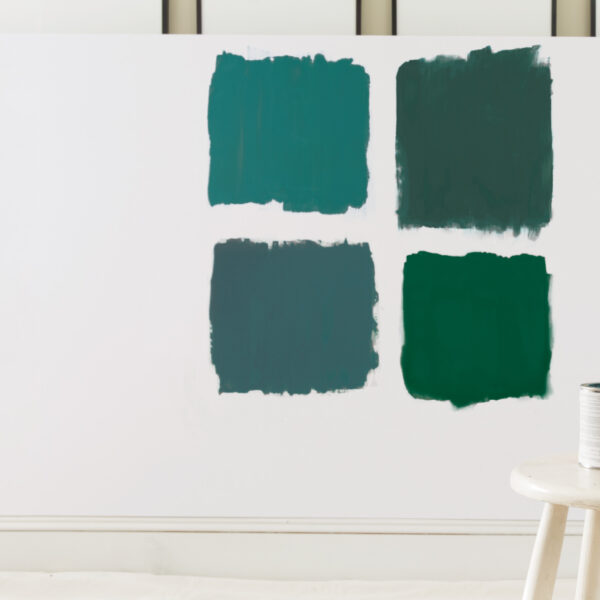 choosing paint colors by using sample paints